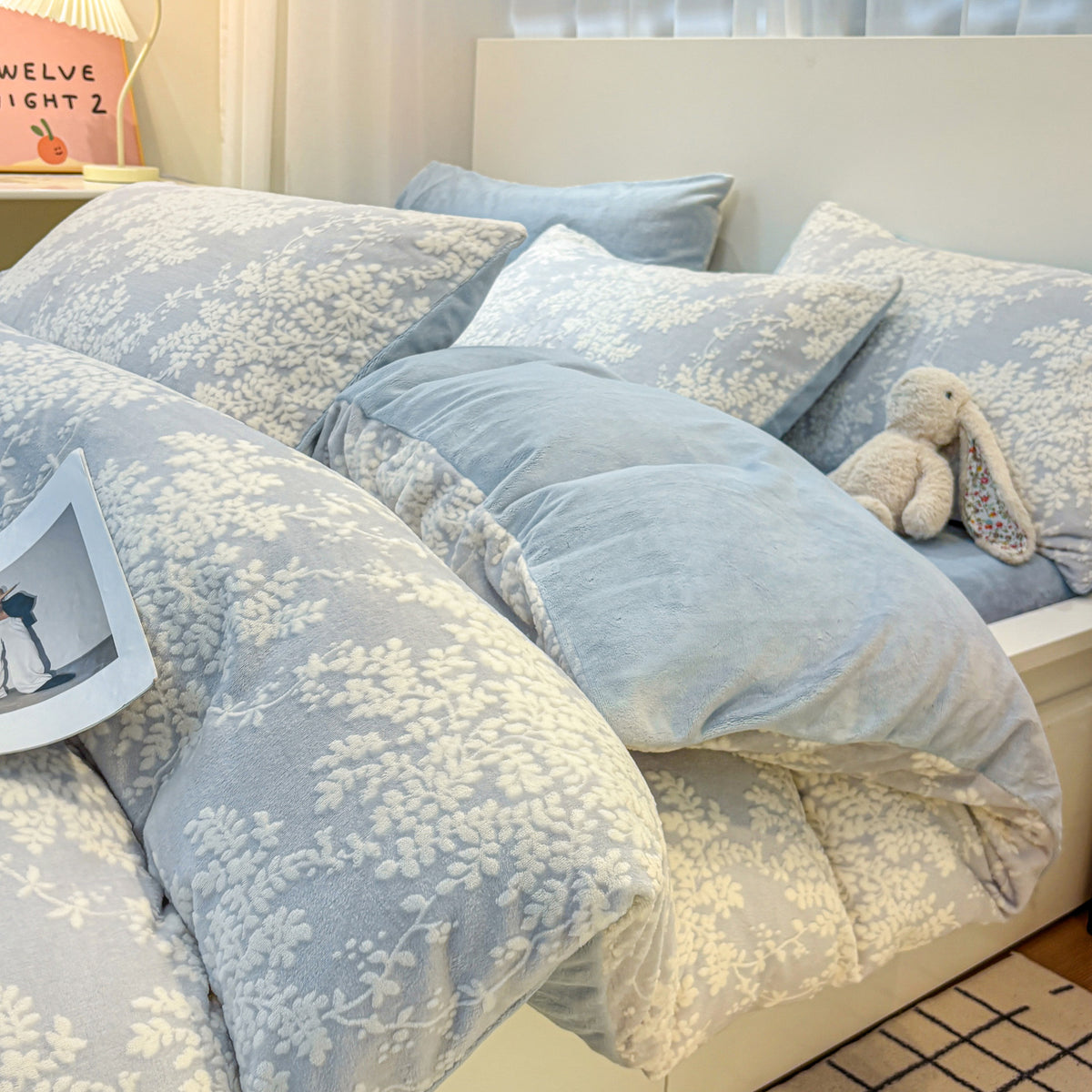 Clementine Blue powder blue duvet bedding with raised white floral detailing, product photo 1