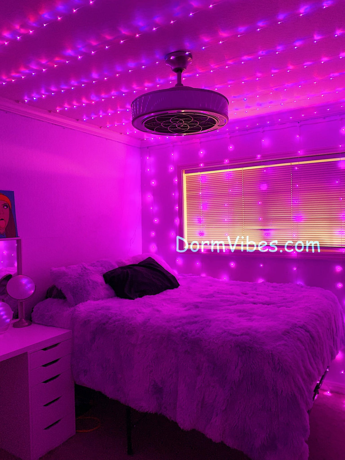 Pink and purple ceiling lights above a bedroom pendant light