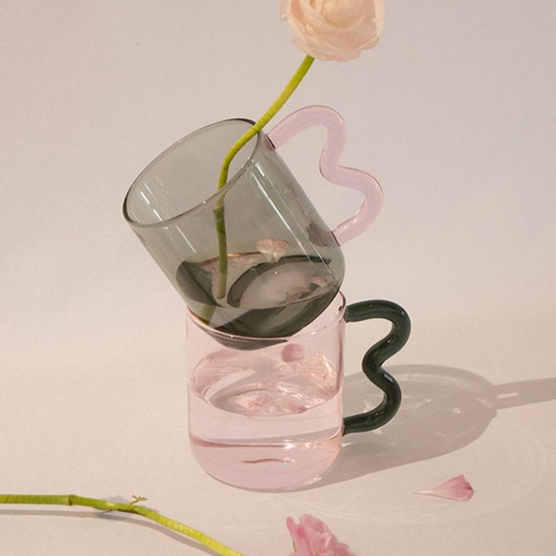 https://www.dormvibes.com/cdn/shop/products/handmade-wavy-handle-glass-mug-original-colorful-design-perfect-for-hot-coffee-tea-and-more-324538.jpg?v=1690644148