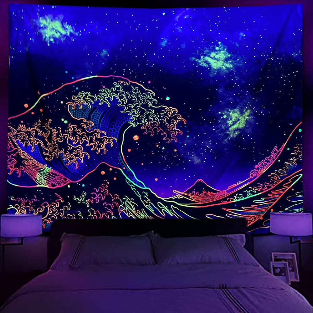 Colorful wave and Mount Fuji tapestry displayed in a purple-lit bedroom