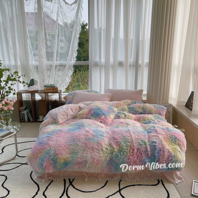 Pastel rainbow PLUFFY bedding beside a window with sheer curtains