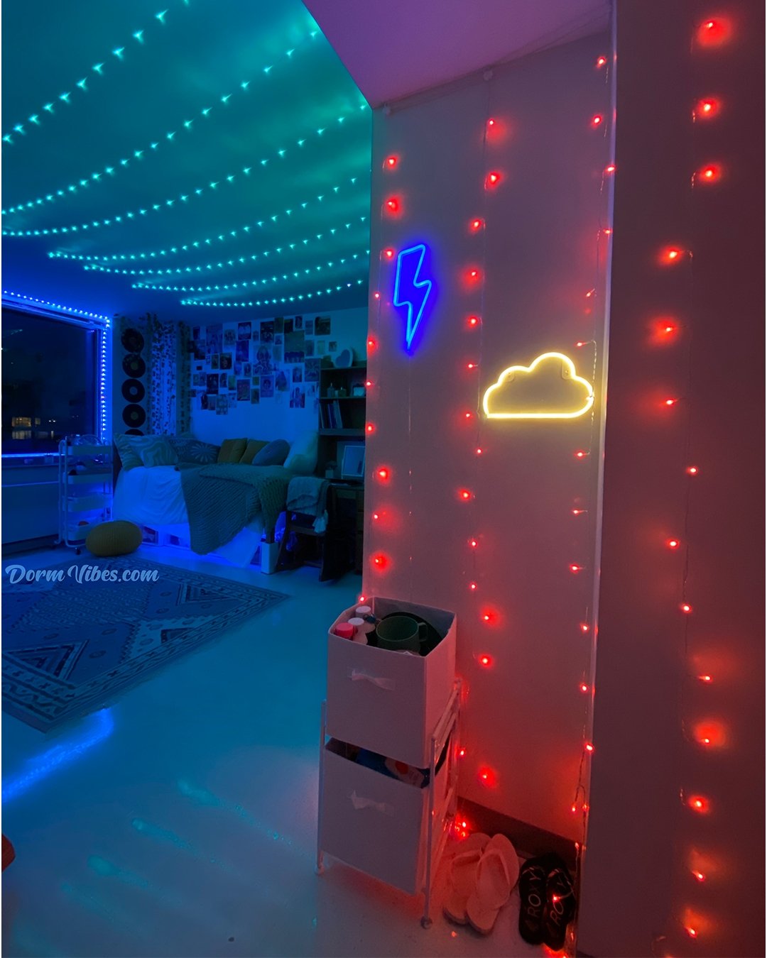 Blue lightning bolt and yellow cloud signs beside red wall lights